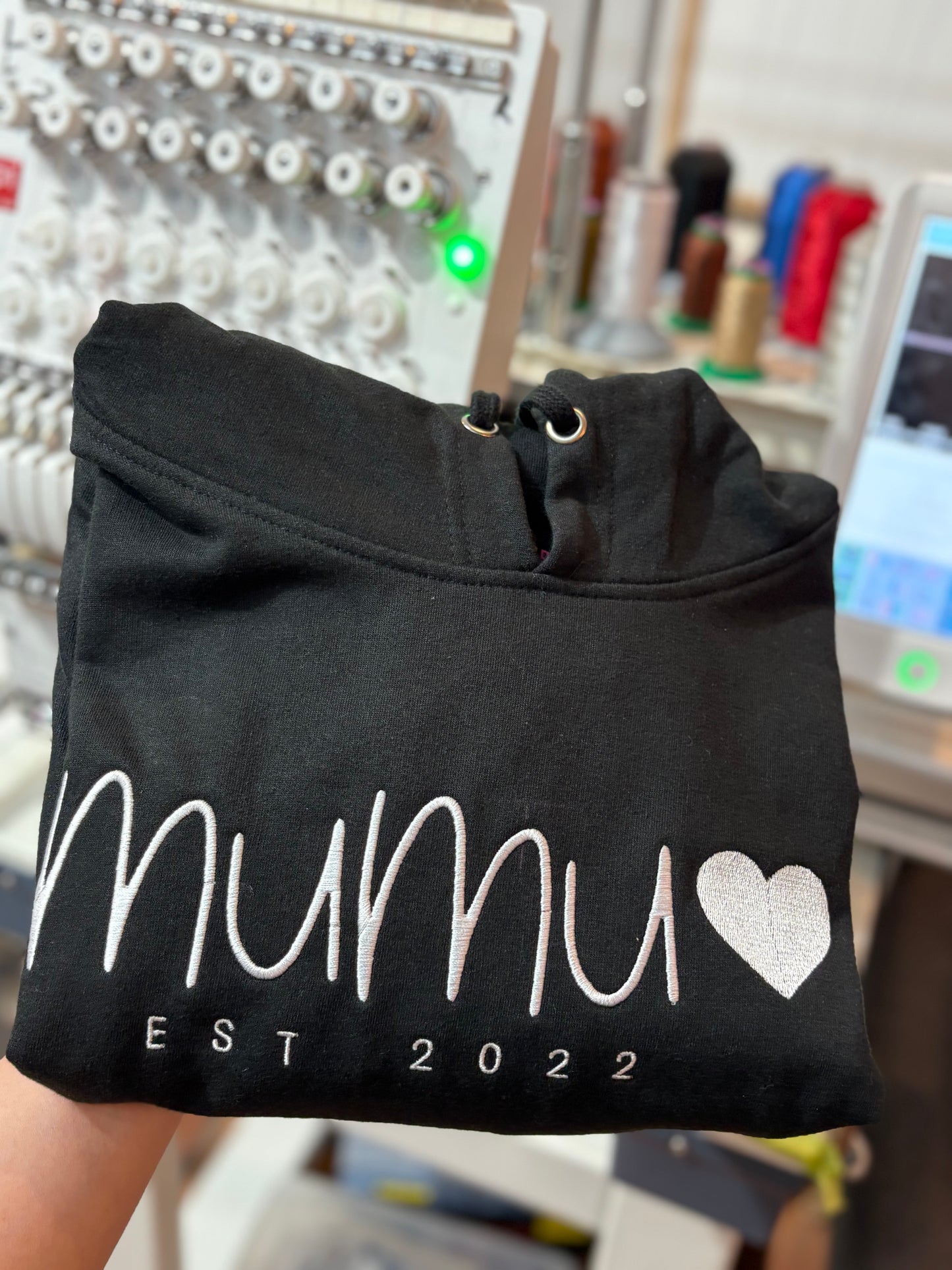 Mama with EST  and names on sleeves Embroidered Hoodies