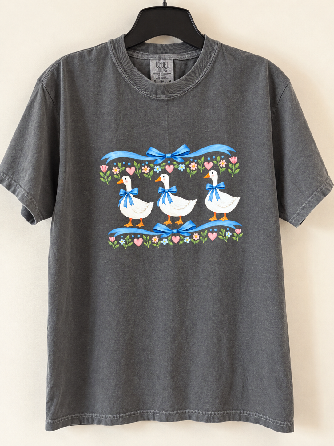 Silly goose with blue ribbon